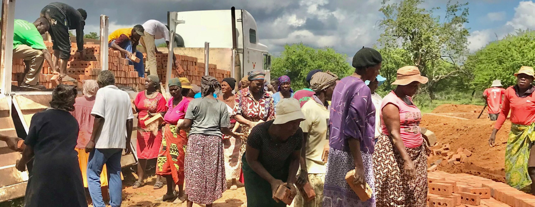 JoNa Community with bricks truck